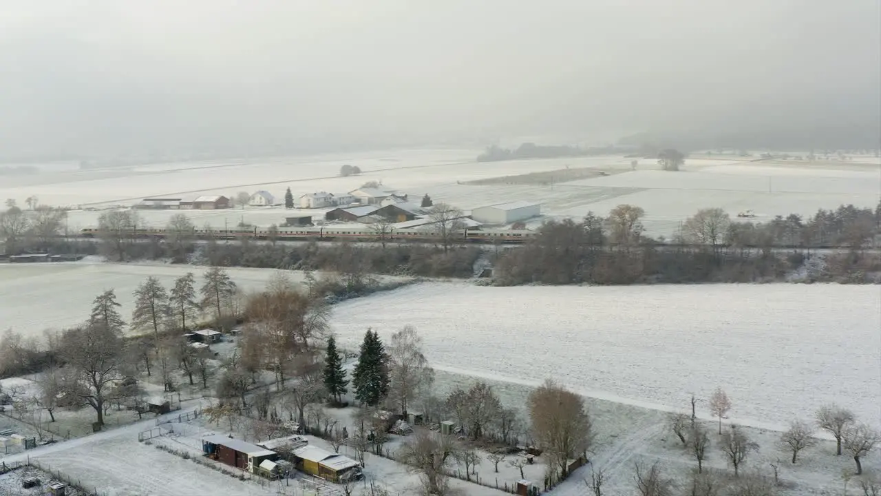 Aerial Drone Shot of Inter City Express ICE Train in Germany in the Snow on a Winters Day