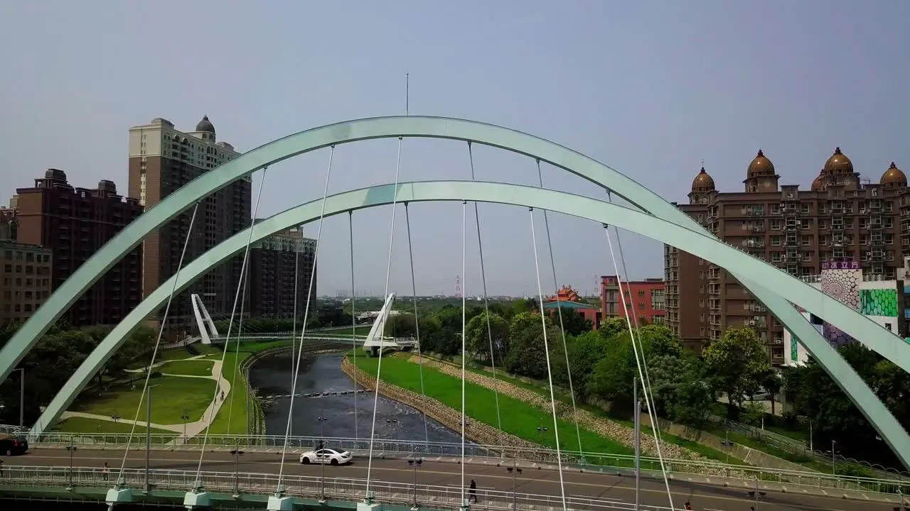 Bridge in Taoyuan Taiwan with city skyline in background