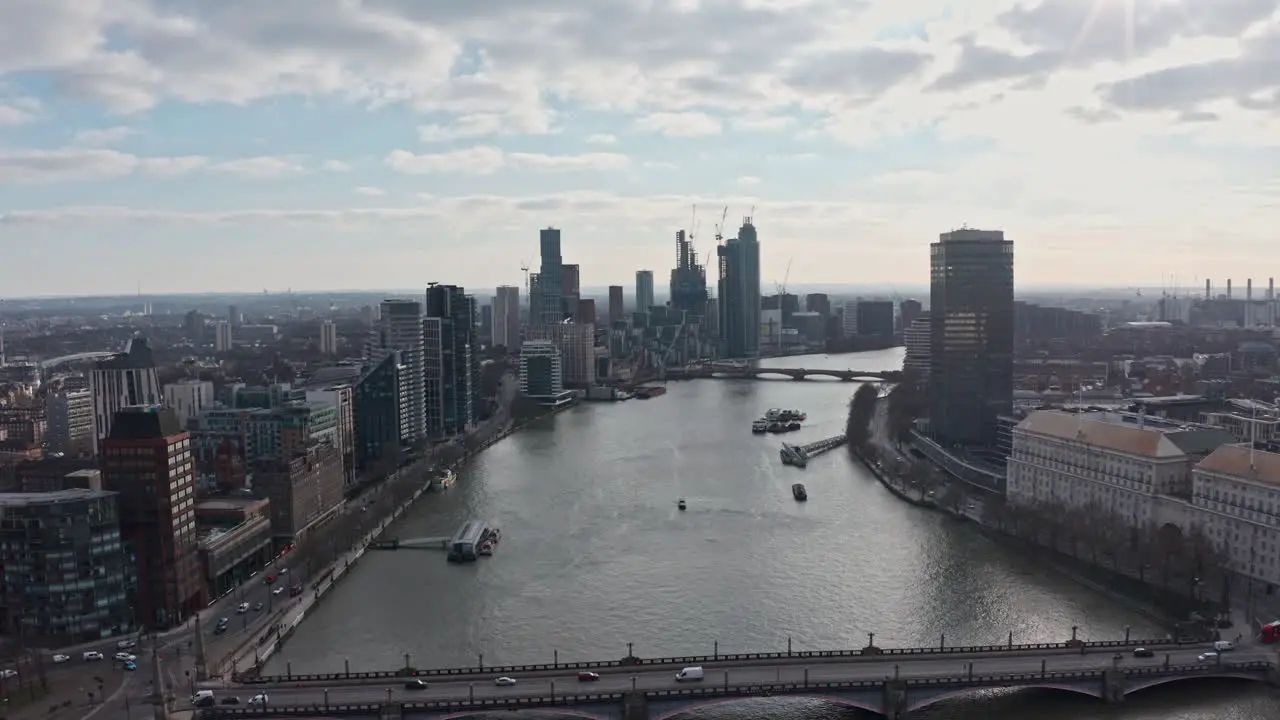 Aerial drone shot towards Vauxhall over river thames from Westminster