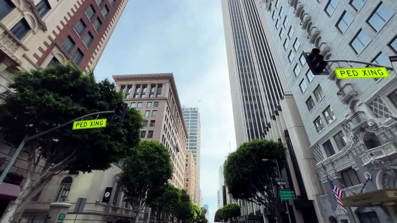 Driving Worms Eye View Of Cityscape And Downtown Buildings In Los Angeles