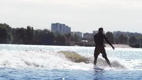 Man practicing water boarding Healthy lifestyle concept Extreme water sport