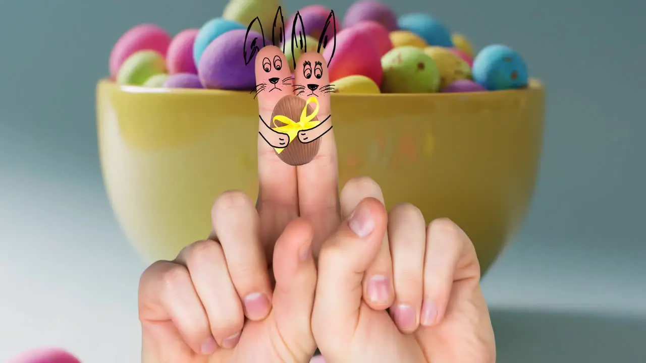 Animation of fingers with easter bunnies and easter egg over bowl of easter eggs on blue background