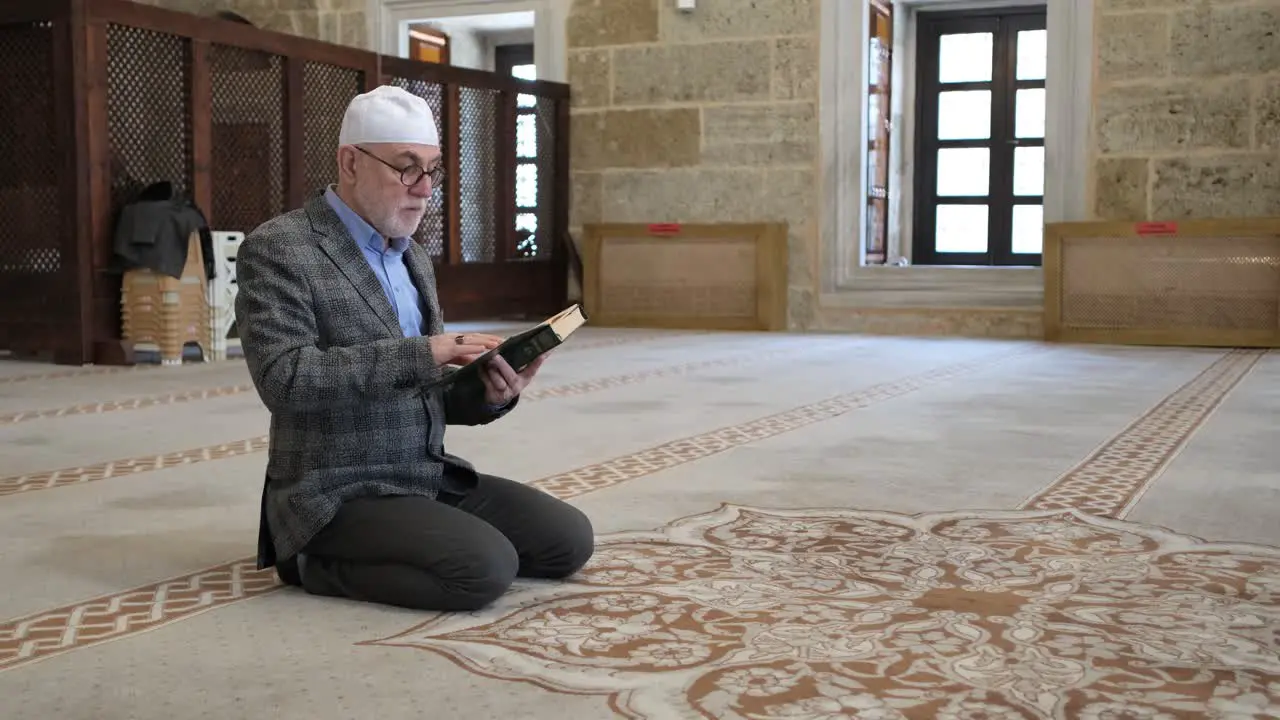 Old man reading quran