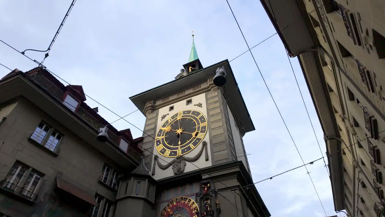 Historic astronomical clock tower with dial in Bern city center