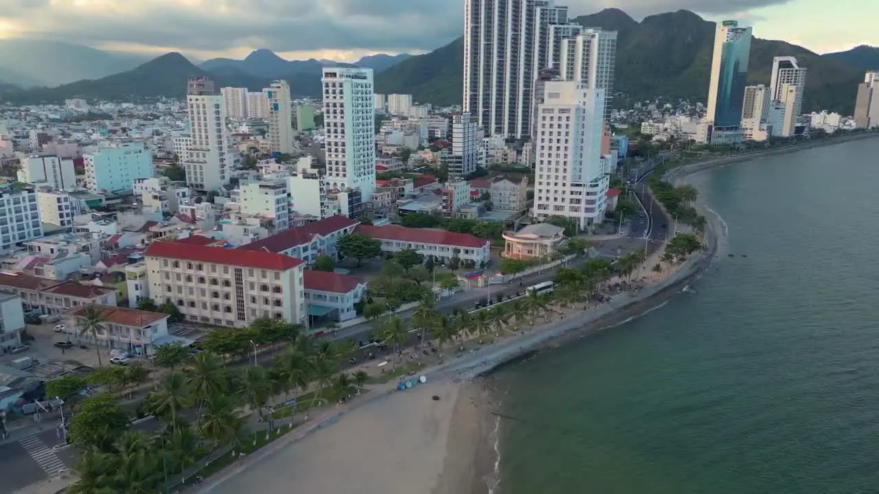 Aerial clip of Nha Trang city in Vietnam showing urban landscape near sea