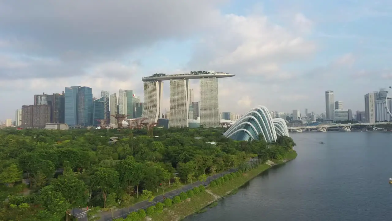 Aerial drone shot of Marina Barrage in Singapore in the morning