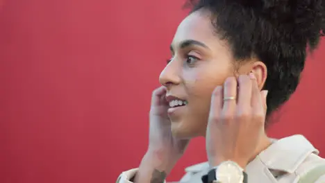 Happy black woman listening to music