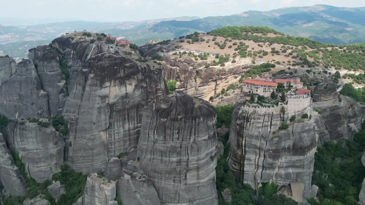 Meteora Monasteries in Greece Mainland Popular Tourist Attraction and Unesco Site Aerial 4k