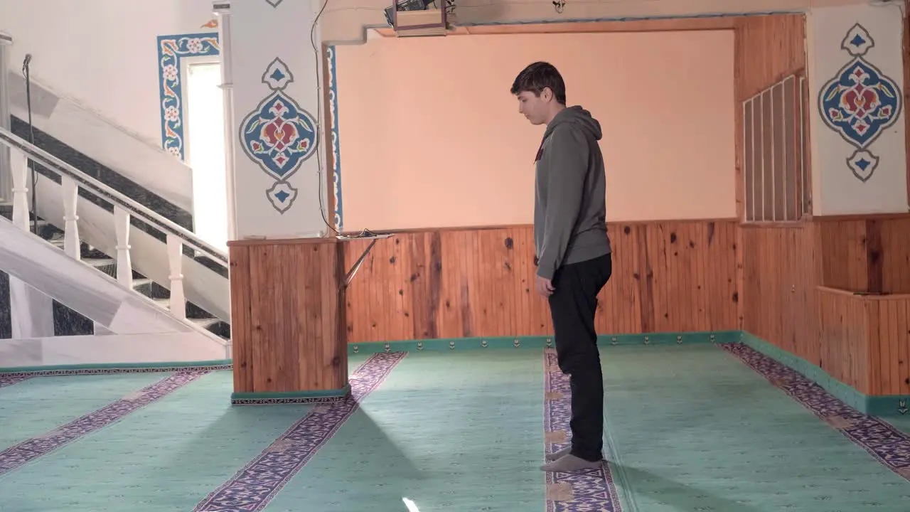 Young Man Praying In Mosque