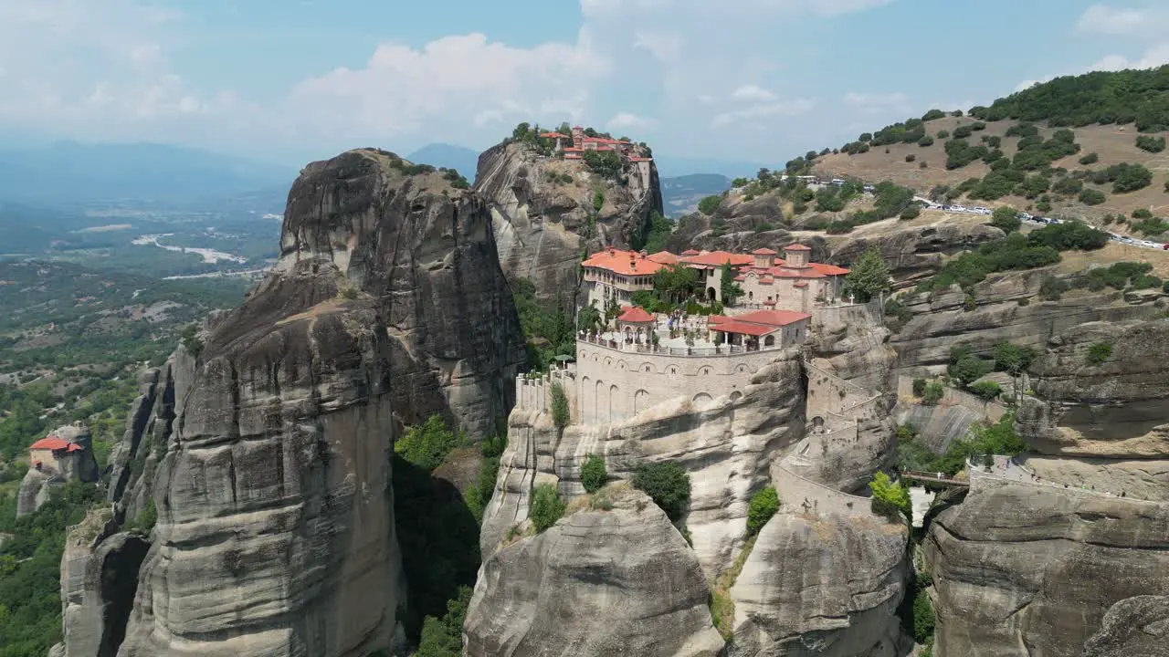 Meteora Monastery in Thessaly Greece Mainland Popular Tourist Attraction and Unesco Site Aerial 4k Pedestal