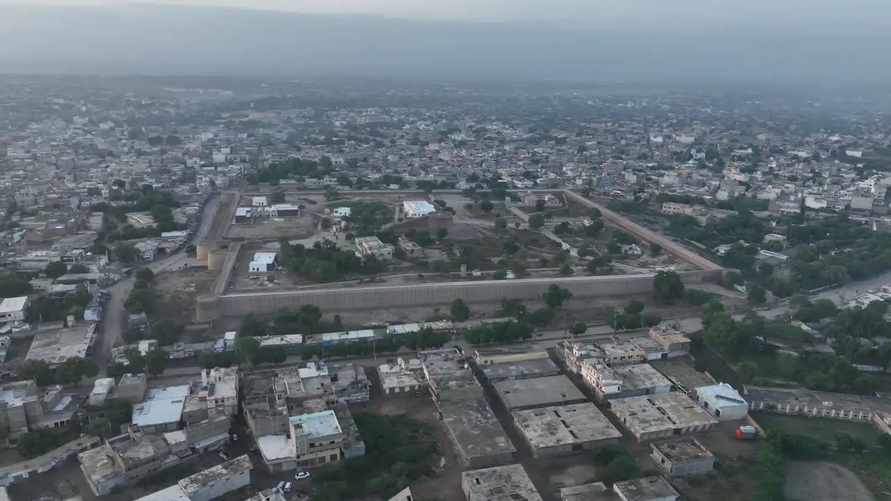 Aerial drone rotating shot over the city of Umerkot in Tharparkar Pakistan on a cloudy evening