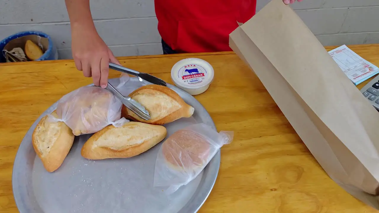 Packing bolillo and pan de muerto at a real Mexican Bakery in Querétaro México