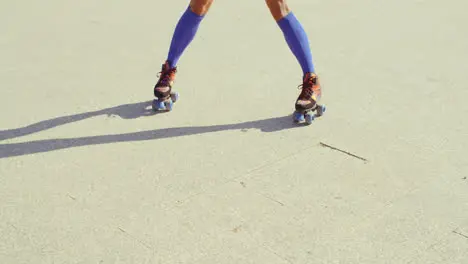 Close Up of Girl Riding Roller Skates