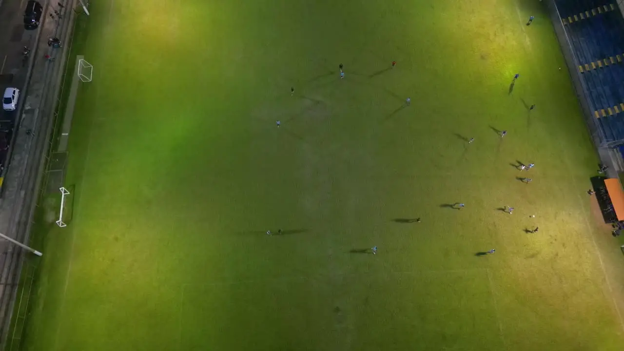 Overhead Drone Shot of Night Time Amatuer Soccer Match