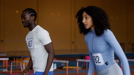 Young people running indoors