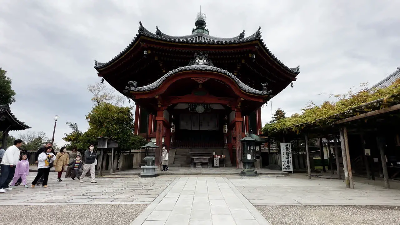 People Praying in Buddhist Temple Nara Japan Static Shot