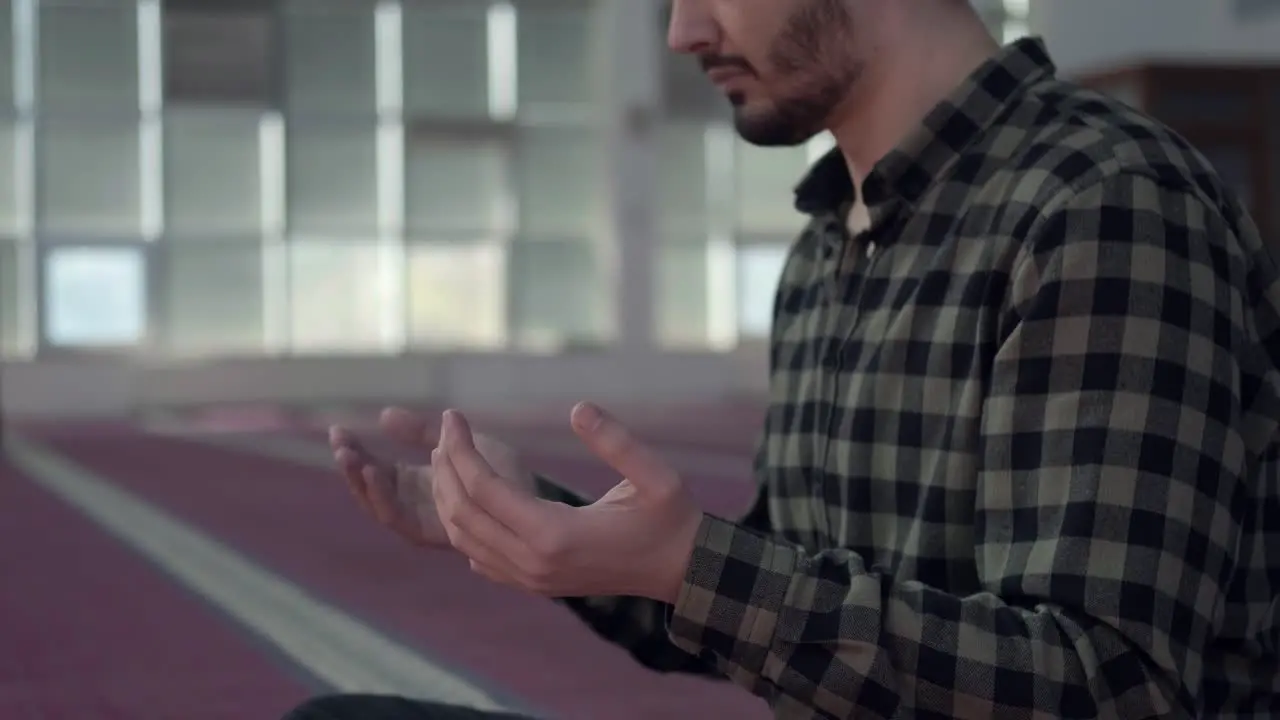 Young Man Praying In Mosque 1