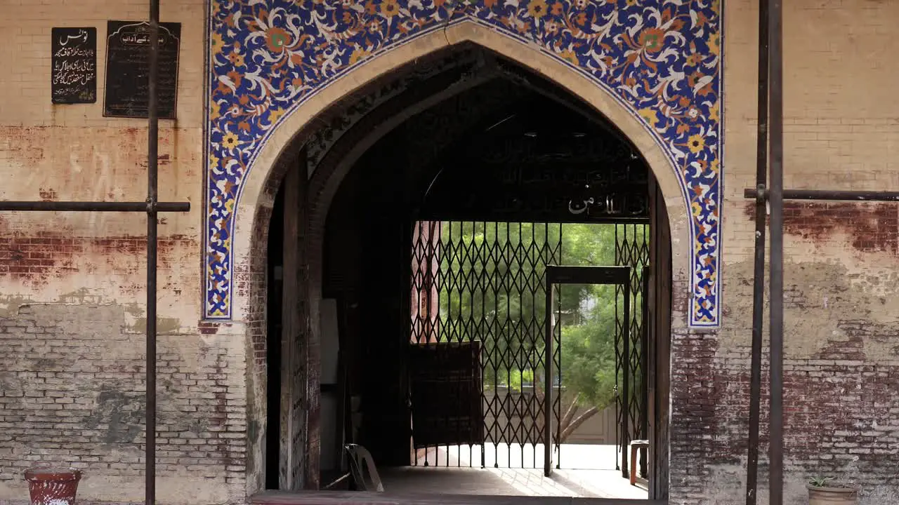 View Of Archway Entrance To Masjid Wazir Khan With Scaffolding On The Sides