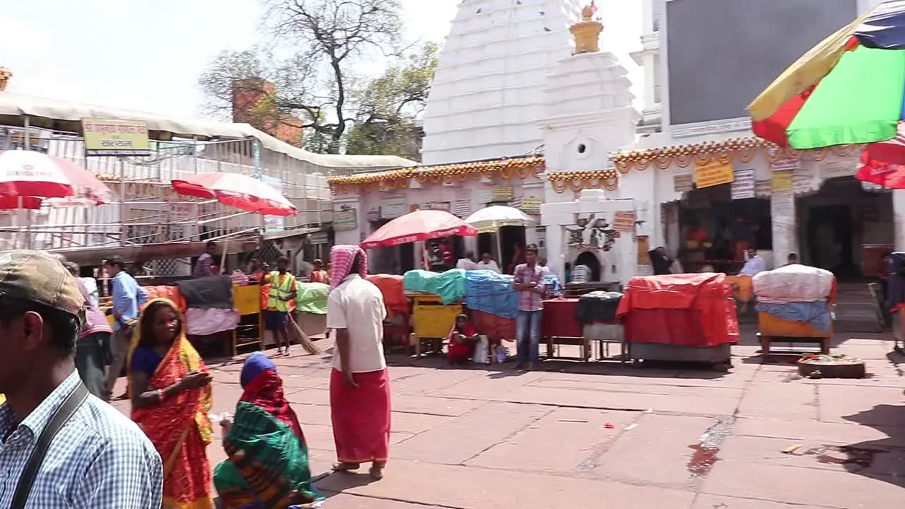 Pilgrims pay rituals and putting scented sticks into a wall at Baidyanath Dham temple in Deoghar Jharkhand in India