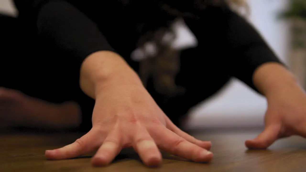 Female yoga instructor is doing gymnastic