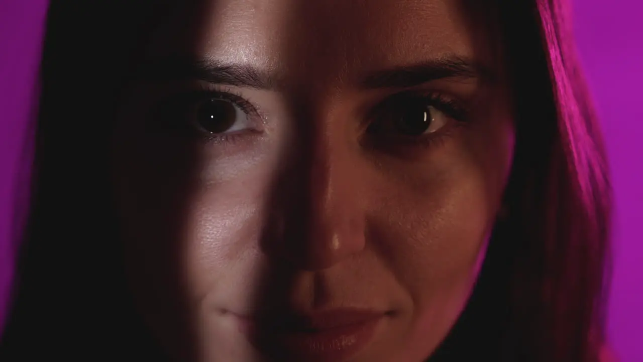 Close Up Portrait Of Female On A Colorful Neon Light Background