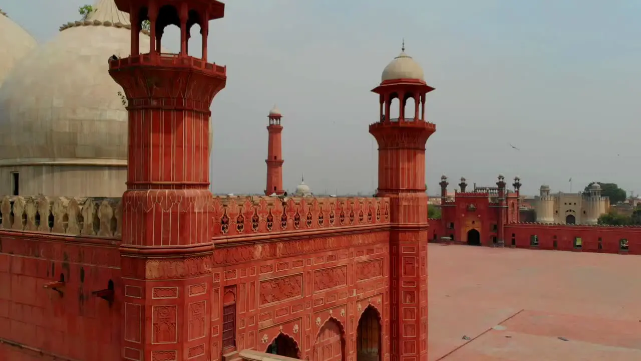 Aerial View From Behind Red Sandstone Wall Of Badshahi Mosque In Pakistan