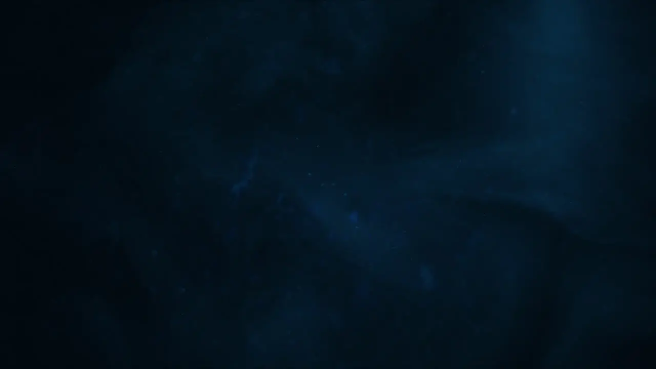 Motion and fly particles on cinematic background with blue grunge texture