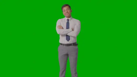 Portrait Of Businessman In Shirt And Tie Against Green Screen Smiling At Camera 4