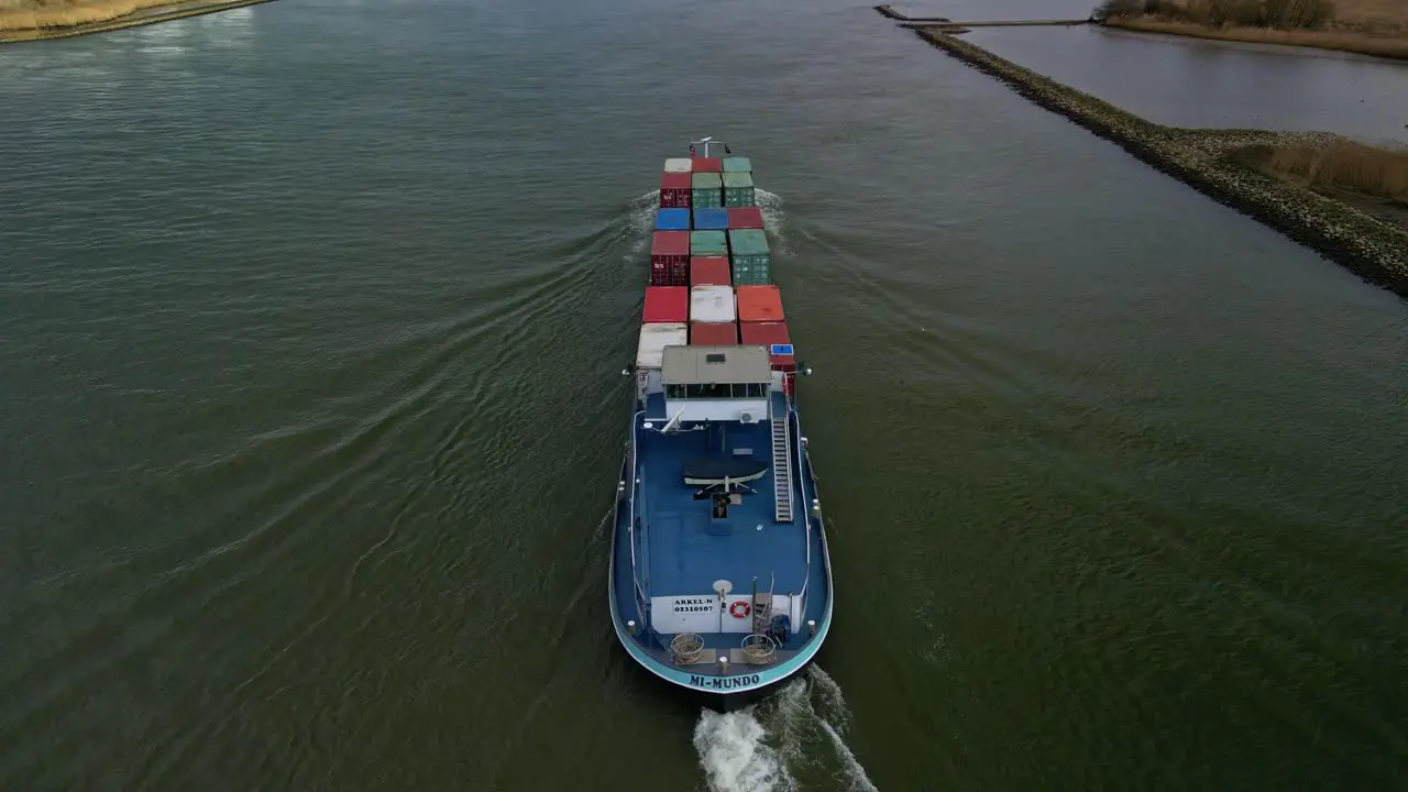 Aerial view Container ship moving through the canal of Zwijndrecht The Netherlands