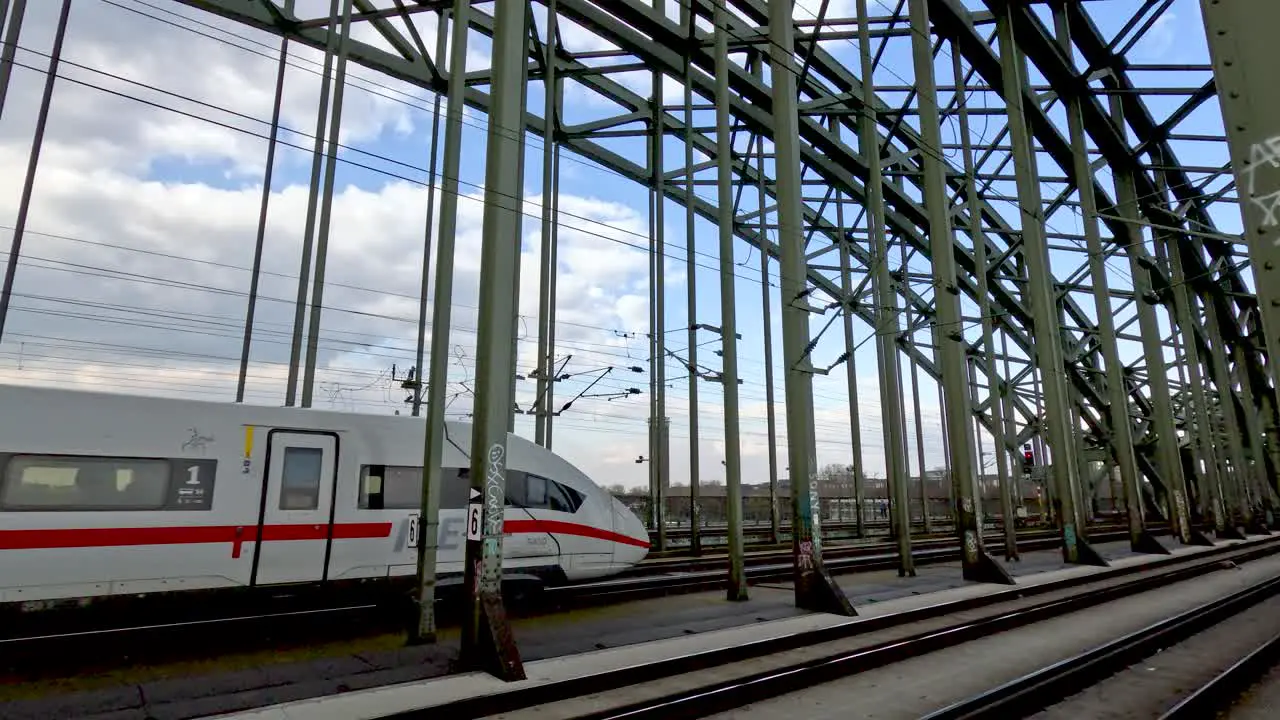 ICE train going across Hohenzollern Bridge in cologne germany