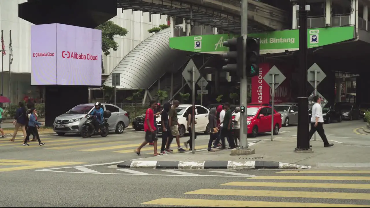 People Crossing Traffic At City Centre Downtown