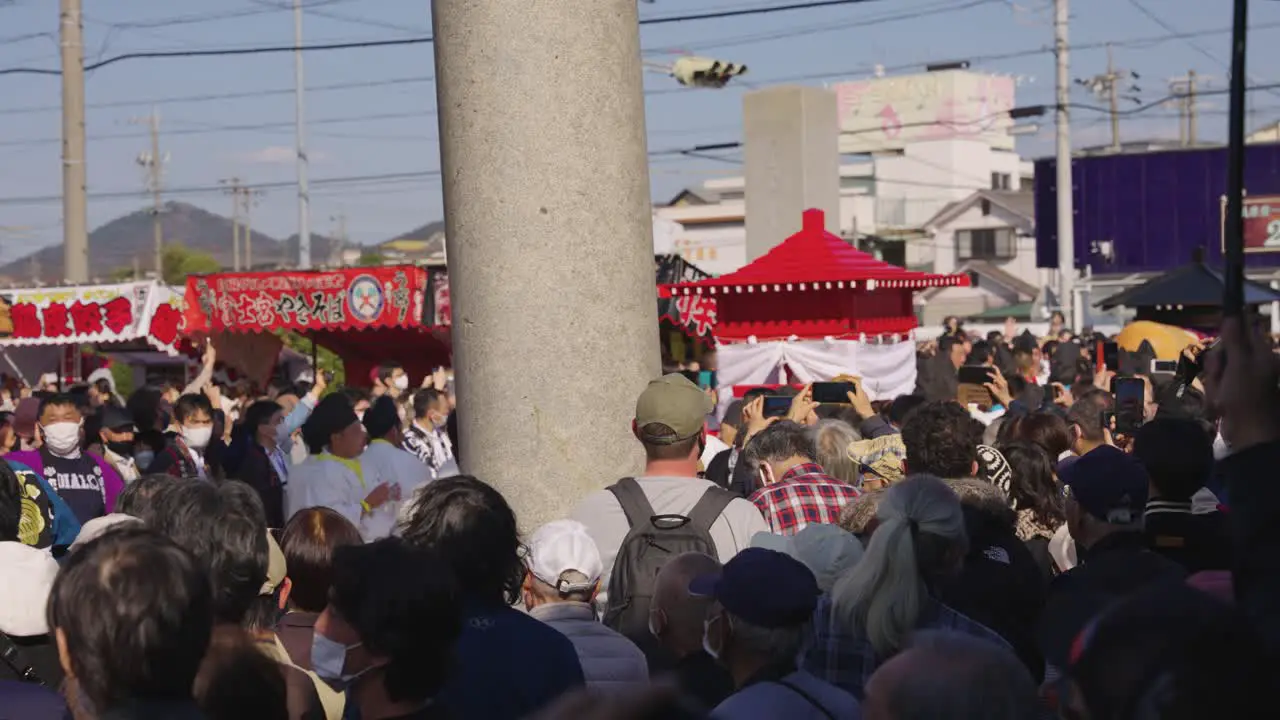 Focus Reveal of Crowd Celebrating Hounensai at Tagata Shrine