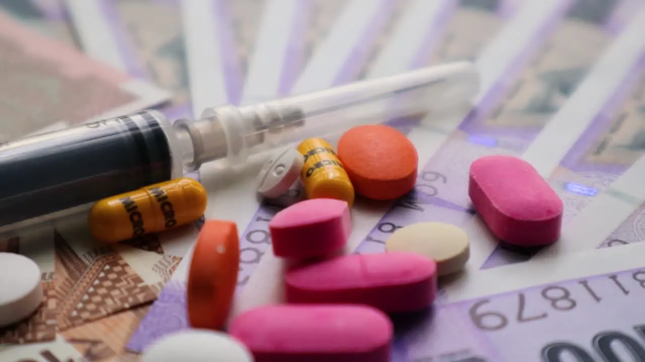 Medical Treatment Expenses Concept Pills and Syringe On Indian Currency zoom View