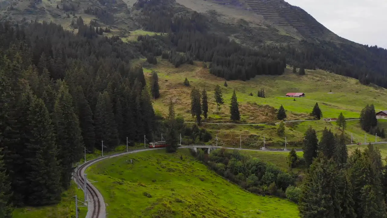 Aerial little mountain train in the Jungfraujoch region 5