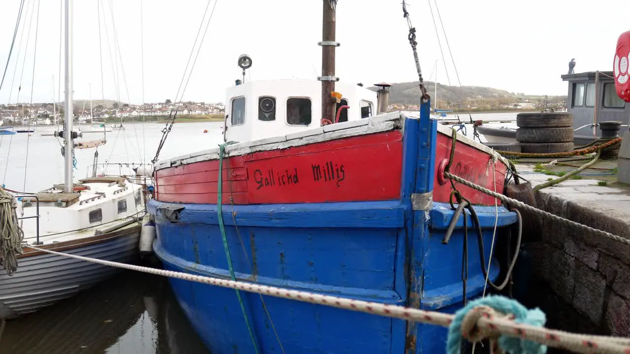 Commercial wooden fishing boat docked on Conwy North Wales harbour