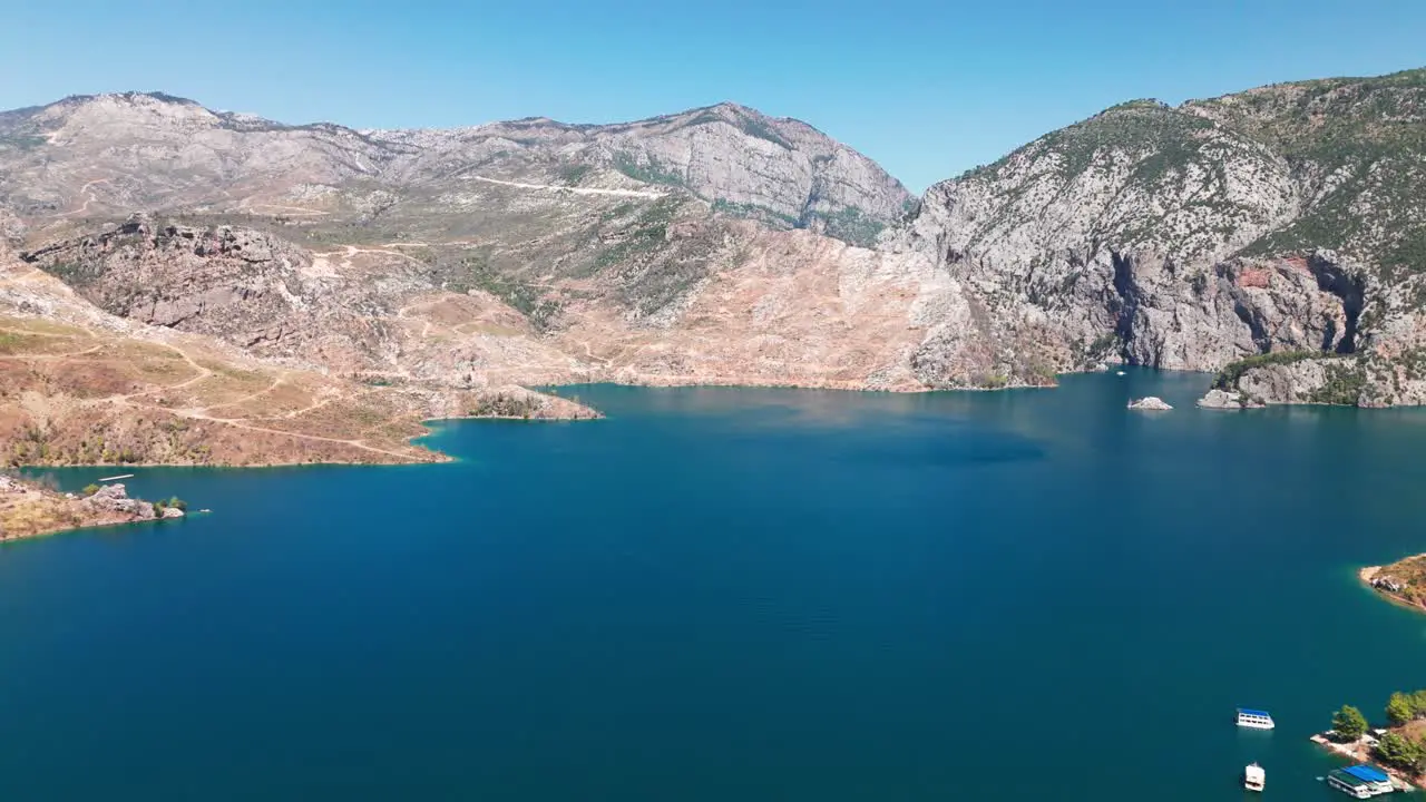 Aerial pullback reveals mystic Green canyon Taurus mountains Turkey