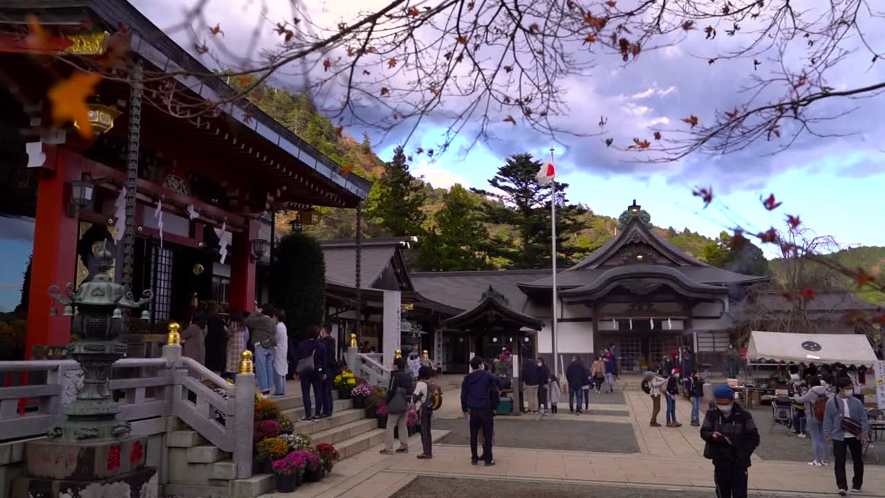 Slow motion push in towards beautiful Afuri Jinja Shrine on top of Mt