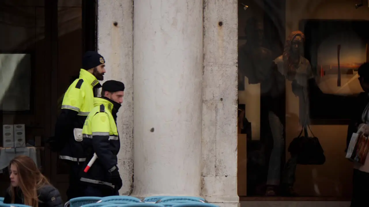 Policemen Walking In St Mark's Square After The Cancelled Carnival In Venice