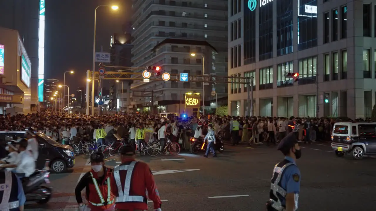 Roads of Osaka Completely blocked by Crowd of People Police Manage Traffic