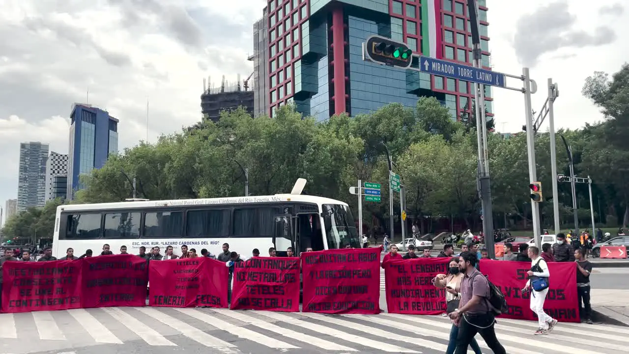 frontal shot of a student blockade in the streets of mexico city