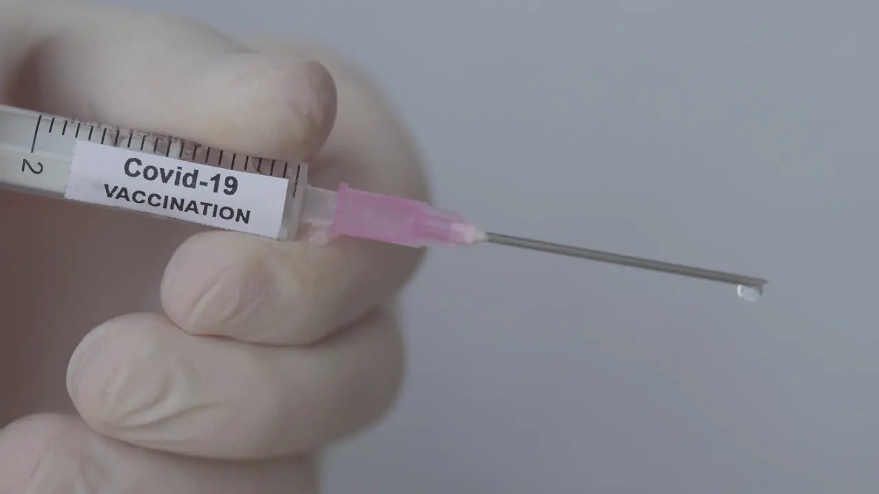 Syringe In Medical Set Up With Corona Virus Vaccine Close Up Shot