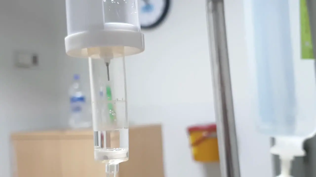 Close Up Of Hanging Medical IV With Slow Drip