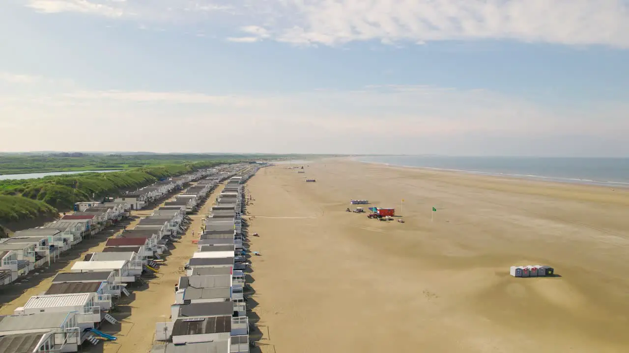 Aerial view flying over rows of beach houses