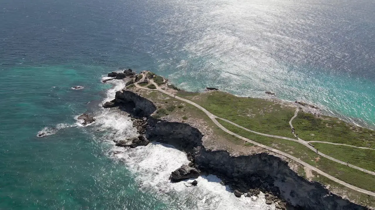 Aerial of Isla Mujeres perfect weather condition zoom out drone shot