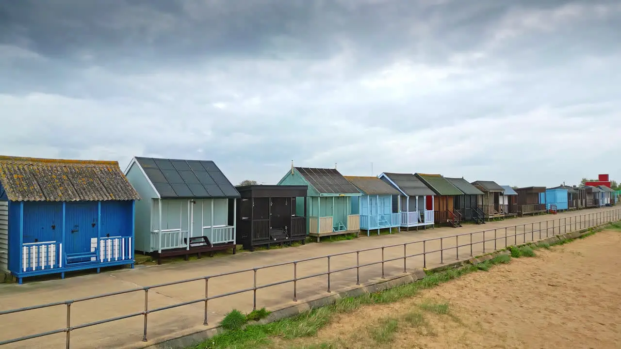 Explore Mablethorpe from above revealing beach huts sandy shores amusement parks rides and the bustling holiday crowd