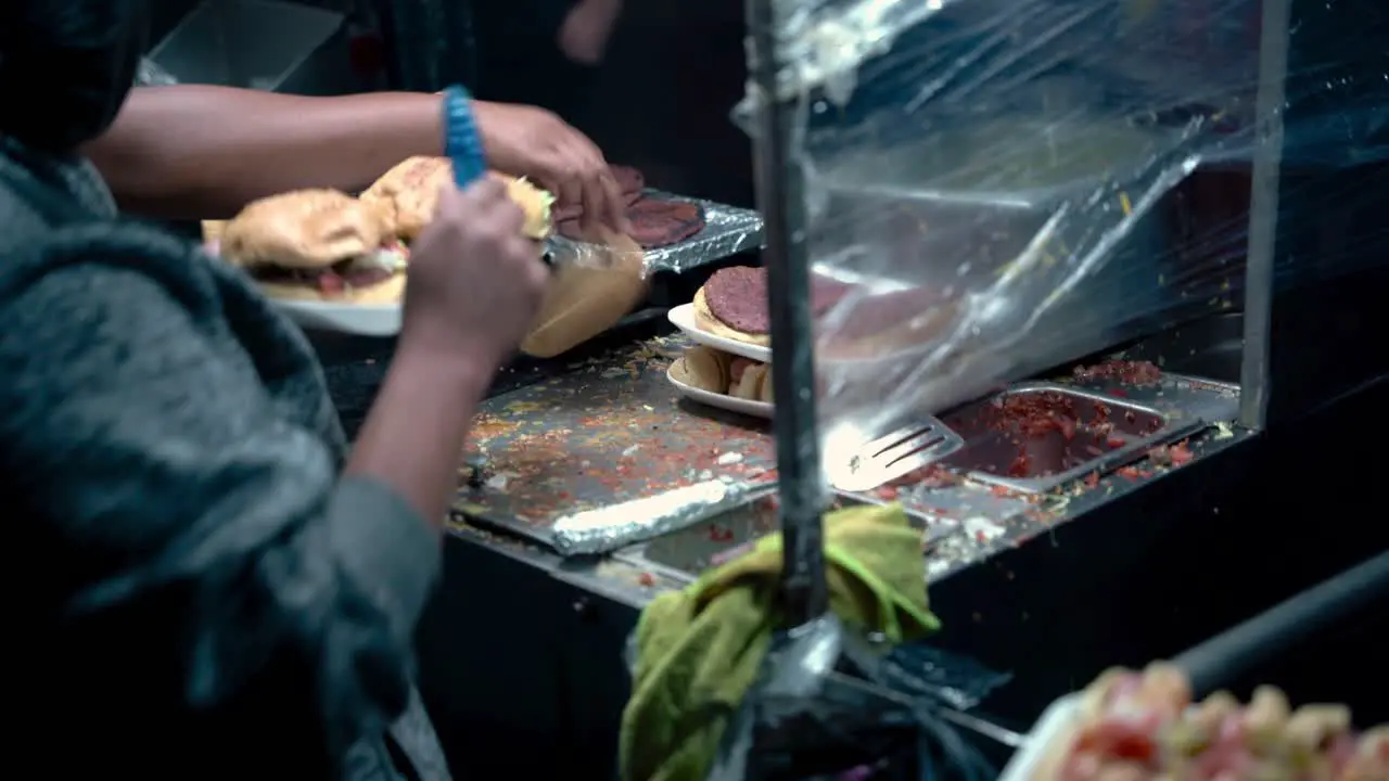 Cooking delicious hamburgers in the streets of Mexico