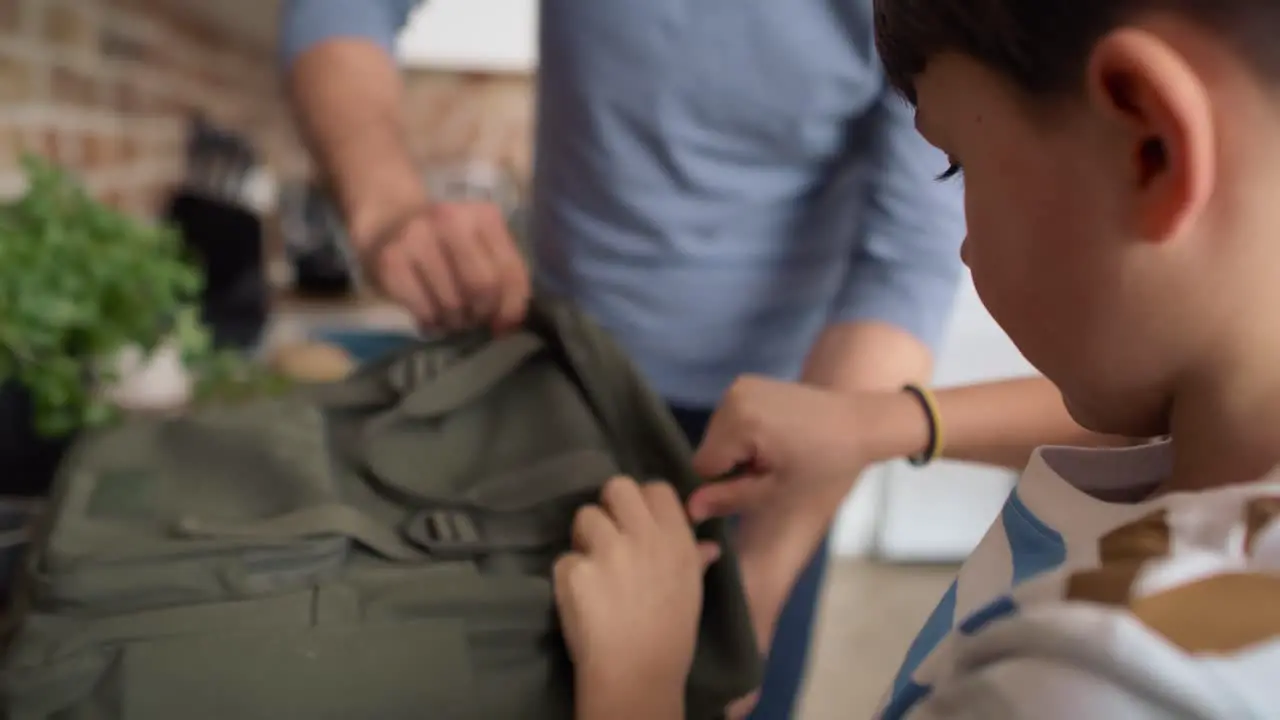 Video of father packing healthy food for son