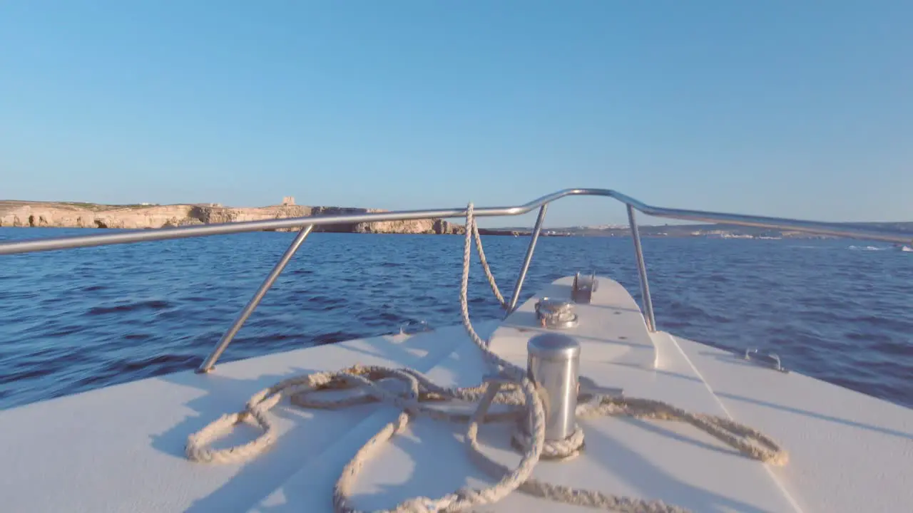 Bow riding a speed boat travelling from Comino to Gozo