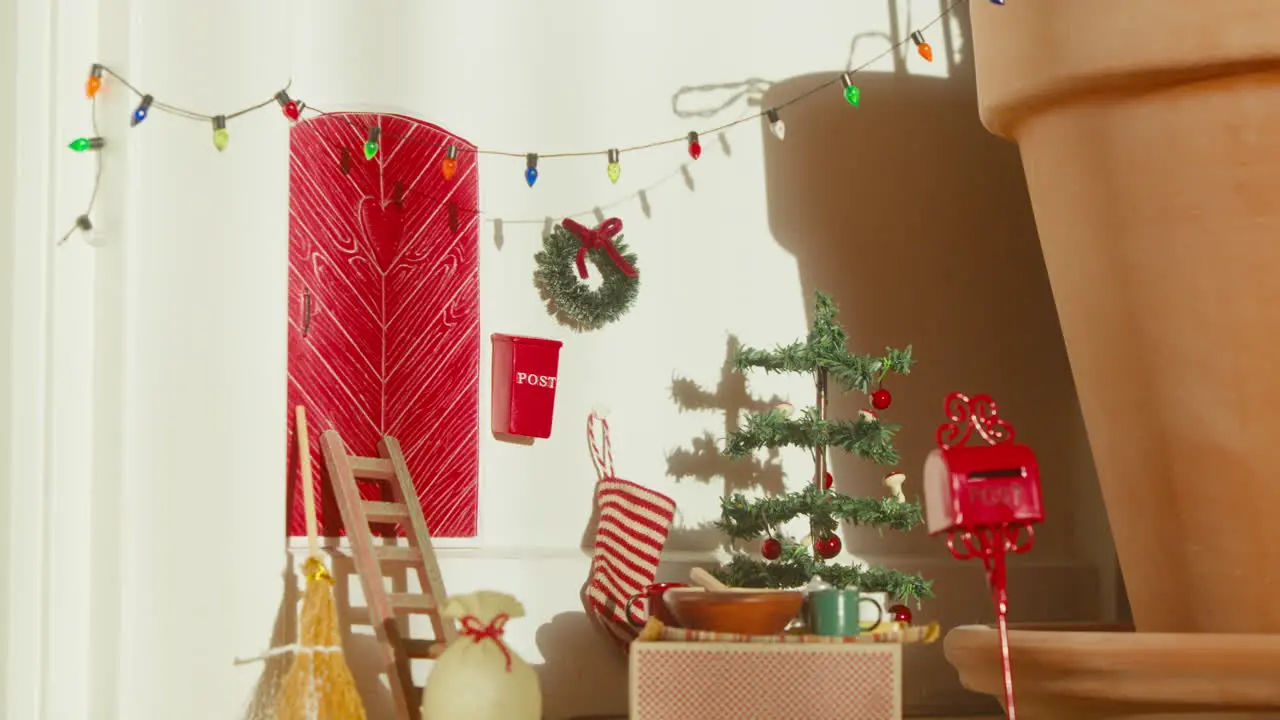 Whimsical Scandinavian Nisse door with festive tree and mailbox