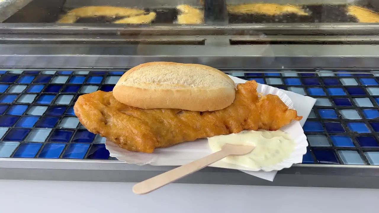 Deep fried fish sandwich at a food stall